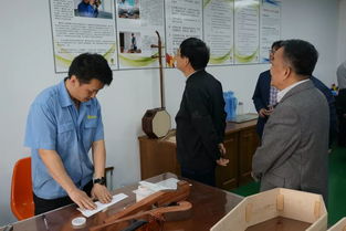 上海市企业联合会副会长兼秘书长蒋苏平莅临上海民族乐器一厂考察调研